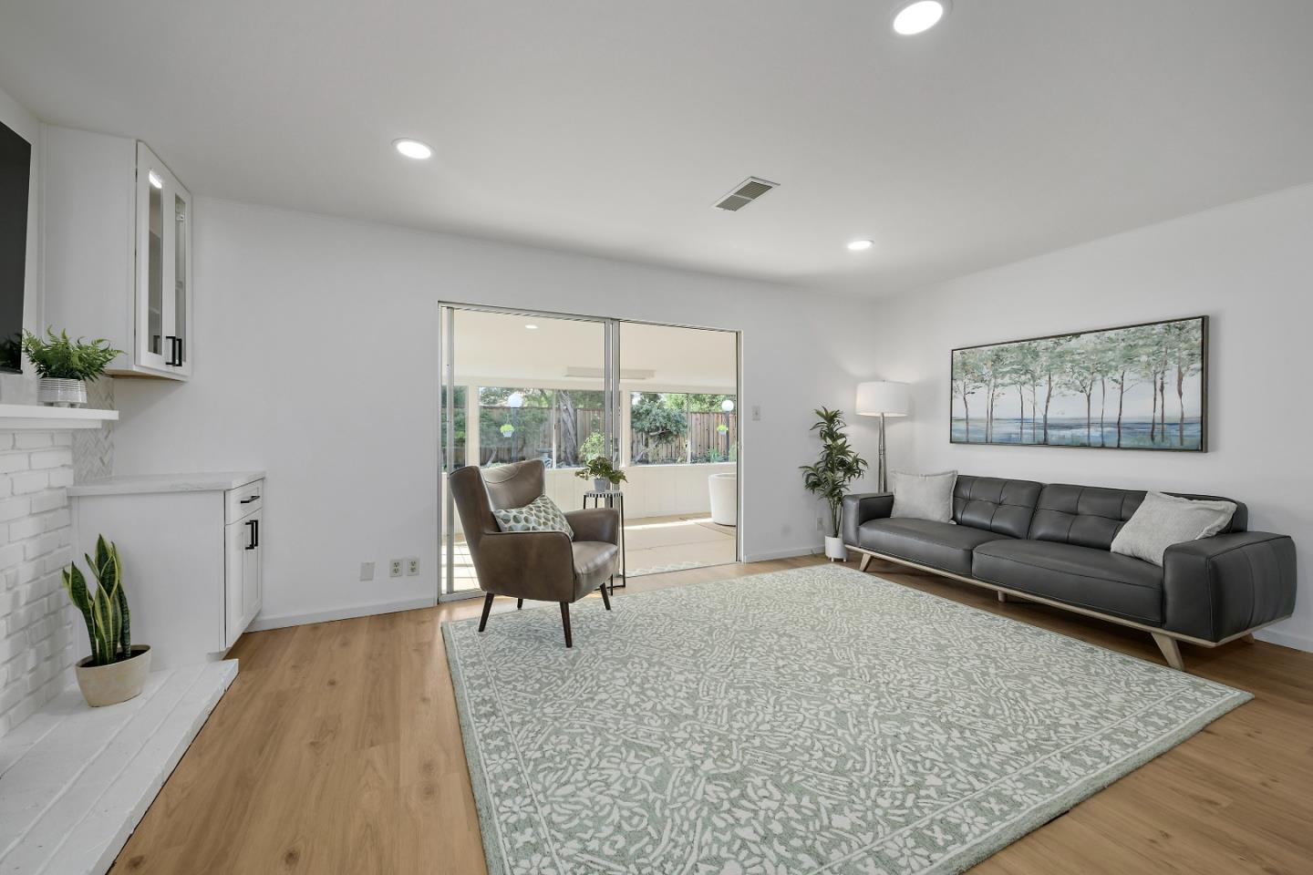 10275 Farallone Drive Cupertino, CA 95014 - Photo 10 of 17 a living room with furniture and a large window