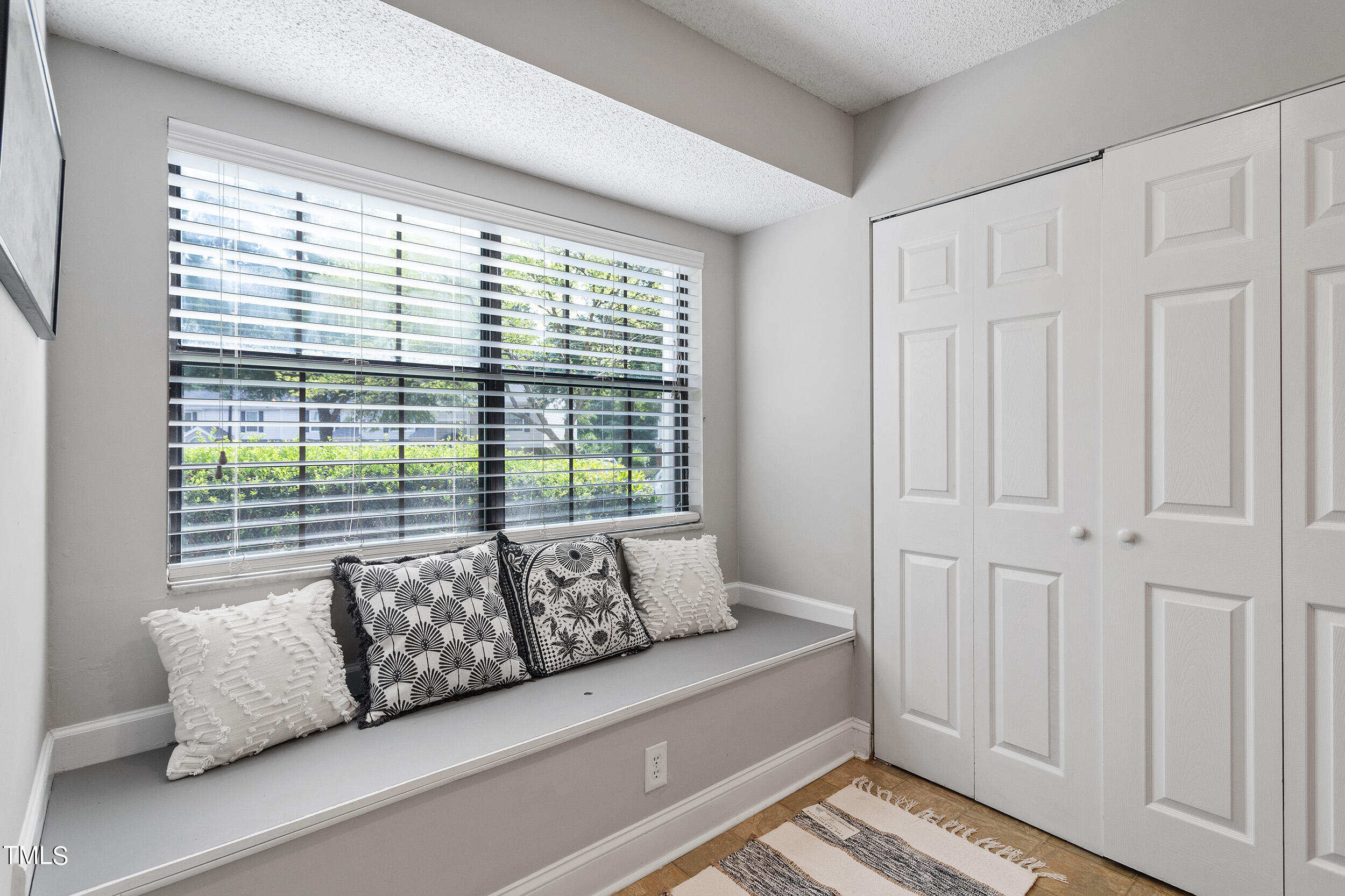 7619 Falcon Rest Circle Raleigh, NC 27615 - Photo 3 of 20 a living room with furniture and a window