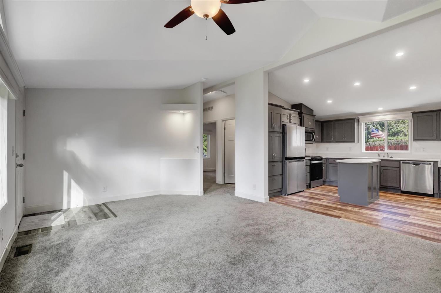 11195 Alpine Lane Grass Valley, CA 95945 - Photo 11 of 71 a view of kitchen with stainless steel appliances refrigerator stove microwave and cabinets