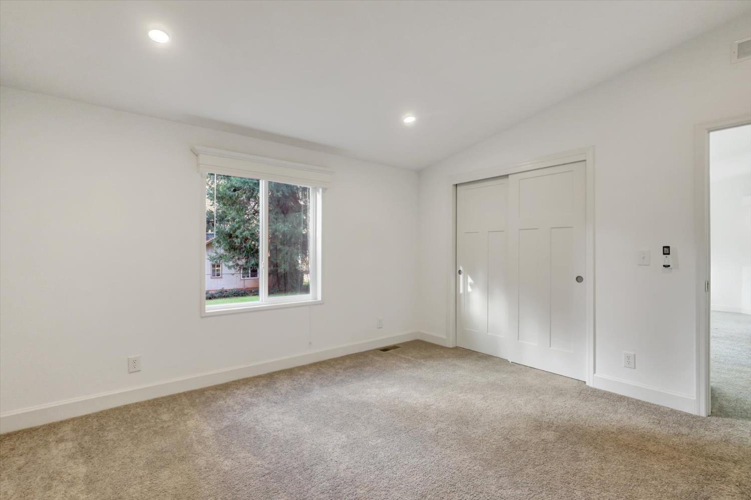 11195 Alpine Lane Grass Valley, CA 95945 - Photo 30 of 71 an empty room with windows
