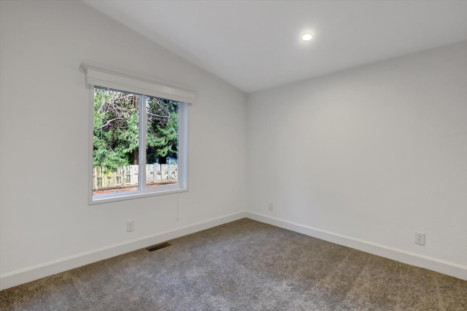 11195 Alpine Lane Grass Valley, CA 95945 - Photo 35 of 71 an empty room with a window