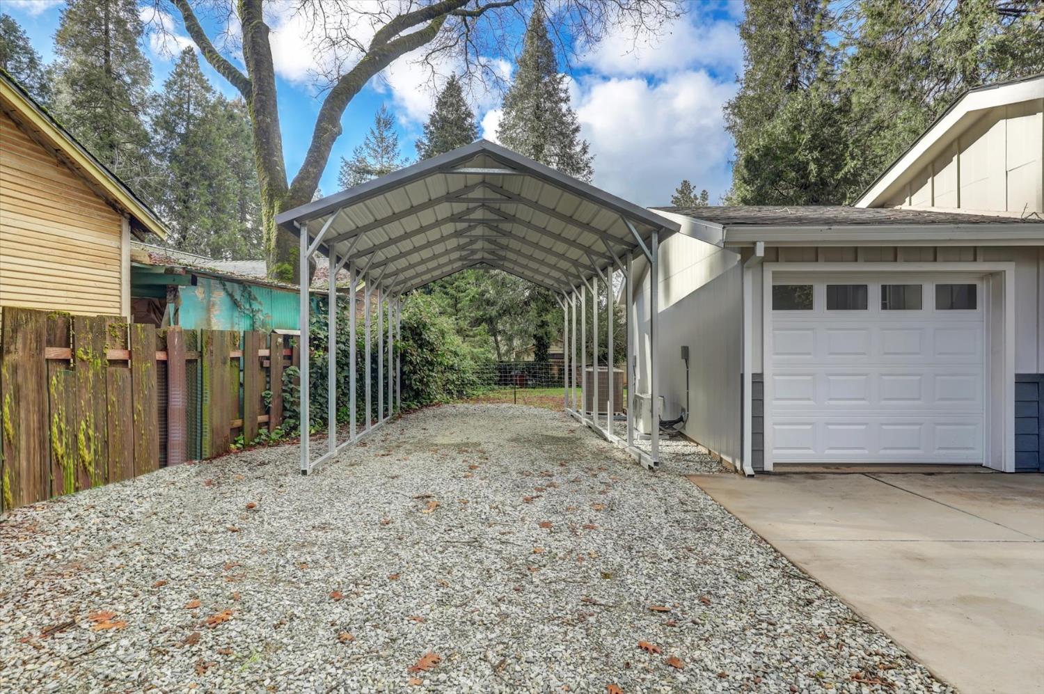 11195 Alpine Lane Grass Valley, CA 95945 - Photo 64 of 71 a view of a house with a wooden fence