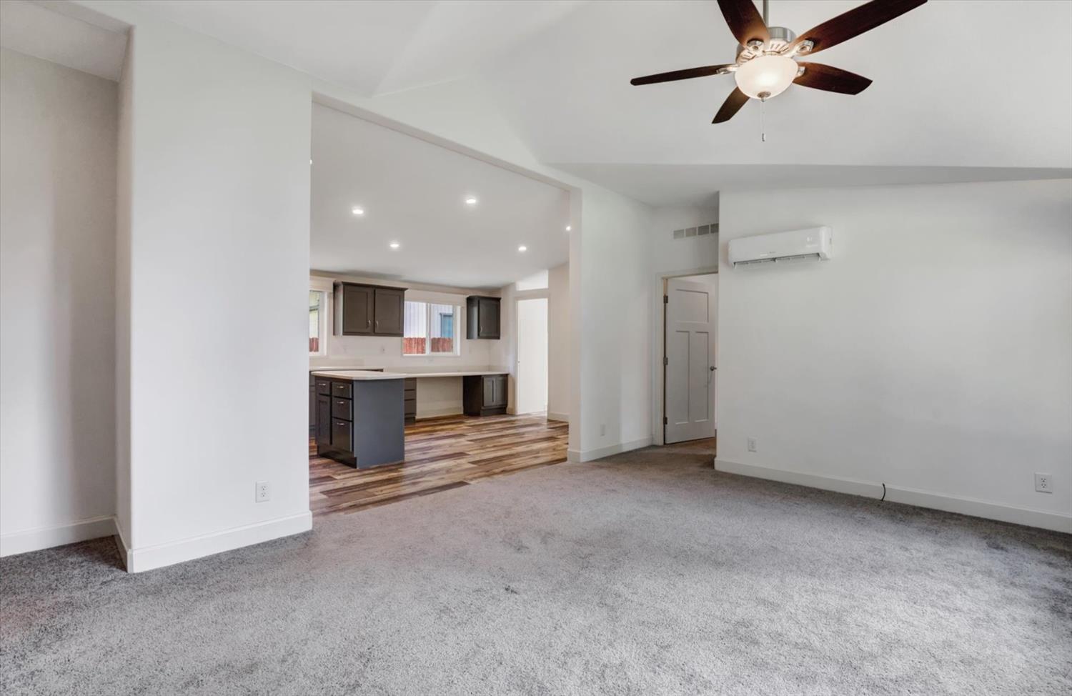 11195 Alpine Lane Grass Valley, CA 95945 - Photo 8 of 71 a view of an empty room with kitchen view and a window