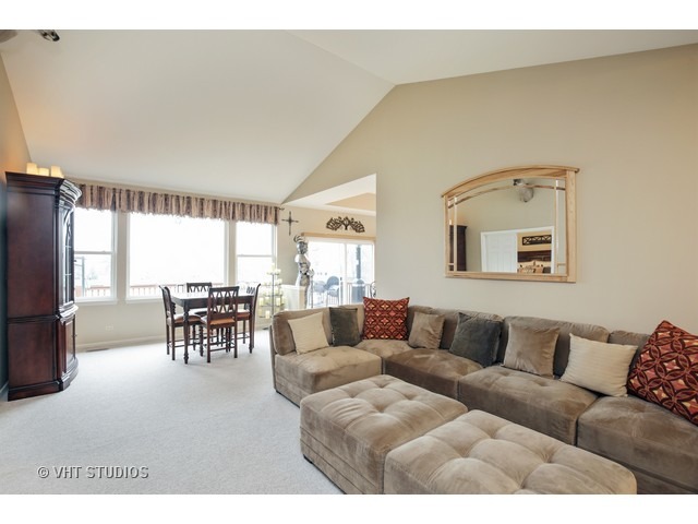1150 Ridgewood Circle Lake In The Hills, IL 60156 - Photo 3 of 20 a living room with furniture and a large window