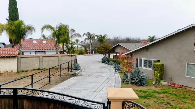 swimming pool view with a seating space