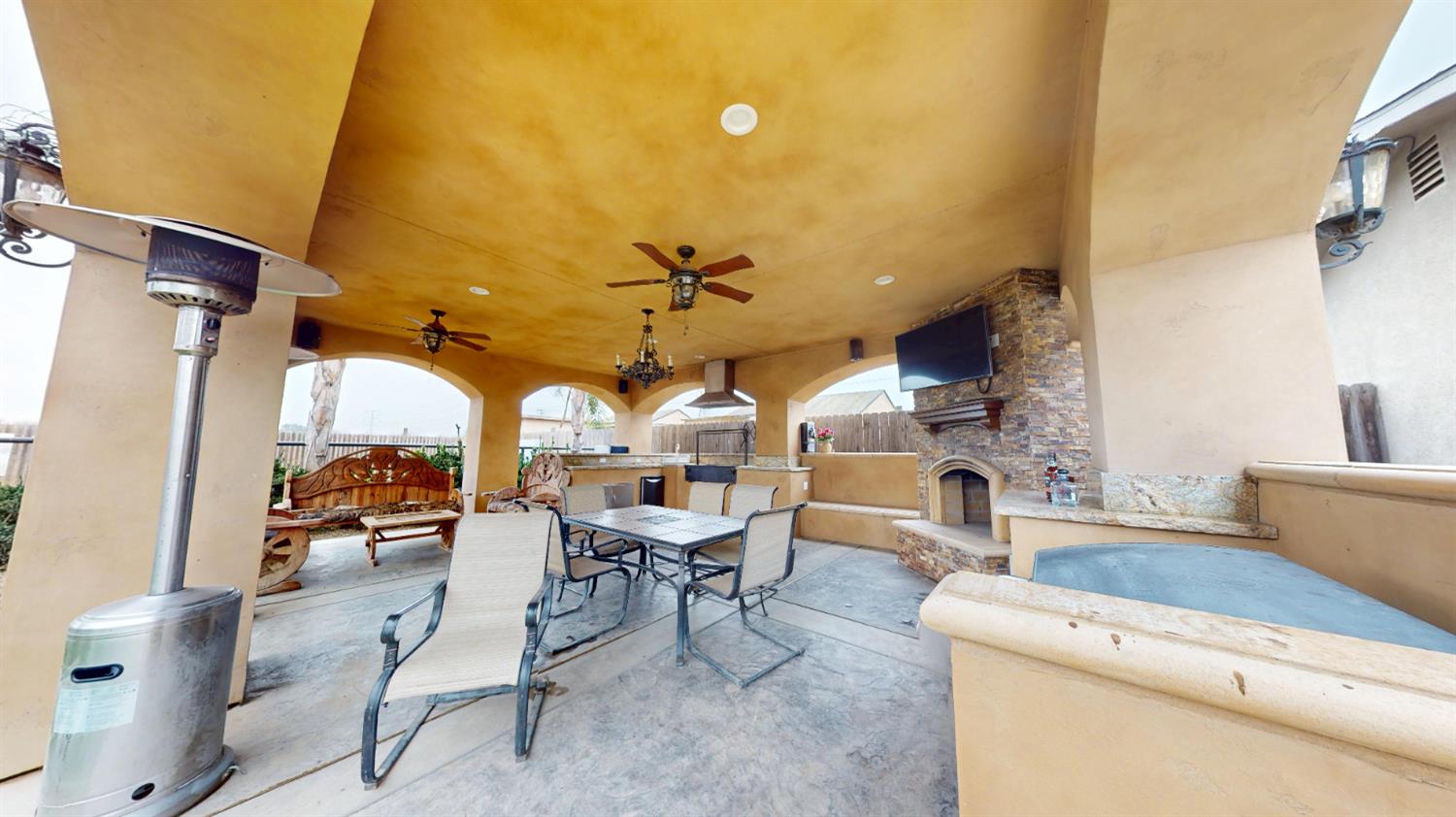 4460 South Carpenter Road Modesto, CA 95358 - Photo 29 of 40 a living room with furniture and a fireplace