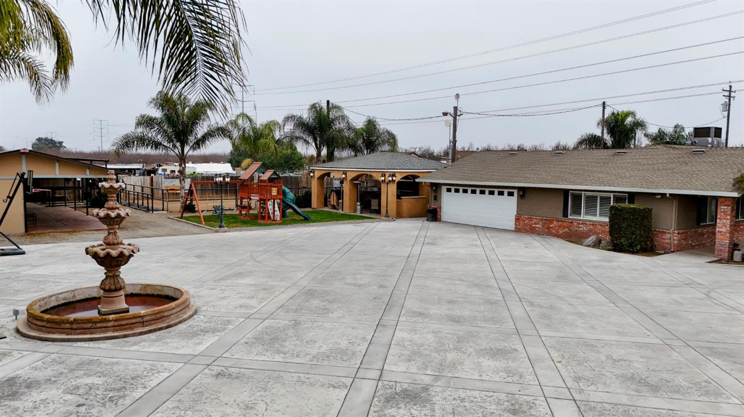 4460 South Carpenter Road Modesto, CA 95358 - Photo 32 of 40 a view of a swimming pool and lounge chair