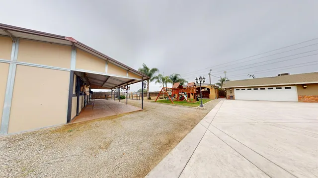 a view of swimming pool with chairs