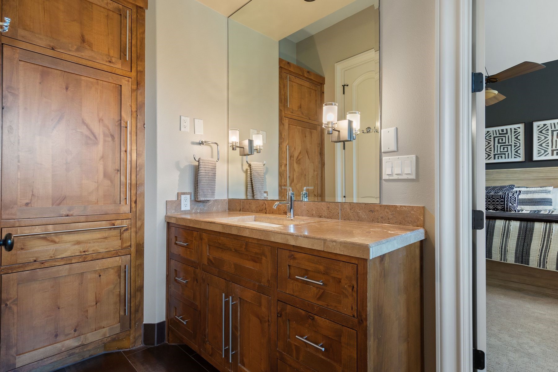 2002 Kinney Avenue, Unit B Austin, TX 78704 - Photo 17 of 34 The bathroom showcases exquisite woodwork, illuminated by an abundance of natural light, creating a serene and inviting atmosphere.