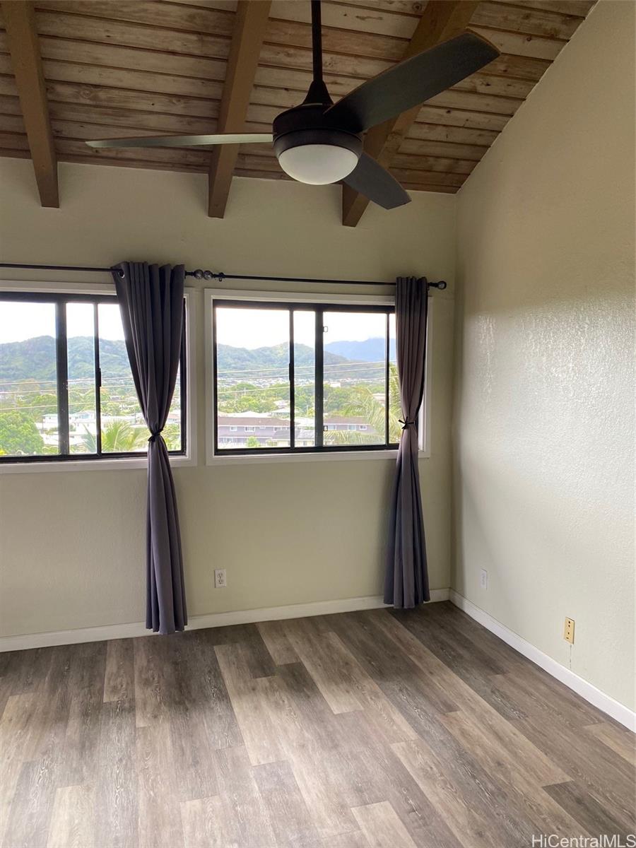 45-315 Lilipuna Road, Unit A306 Kaneohe, HI 96744 - Photo 17 of 19 a view of empty room with wooden floor and fan
