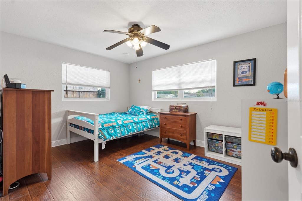 1130 8th Avenue Northeast Largo, FL 33770 - Photo 20 of 39 a bedroom with furniture and a window