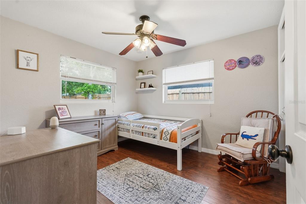 1130 8th Avenue Northeast Largo, FL 33770 - Photo 23 of 39 a bedroom with furniture and a window