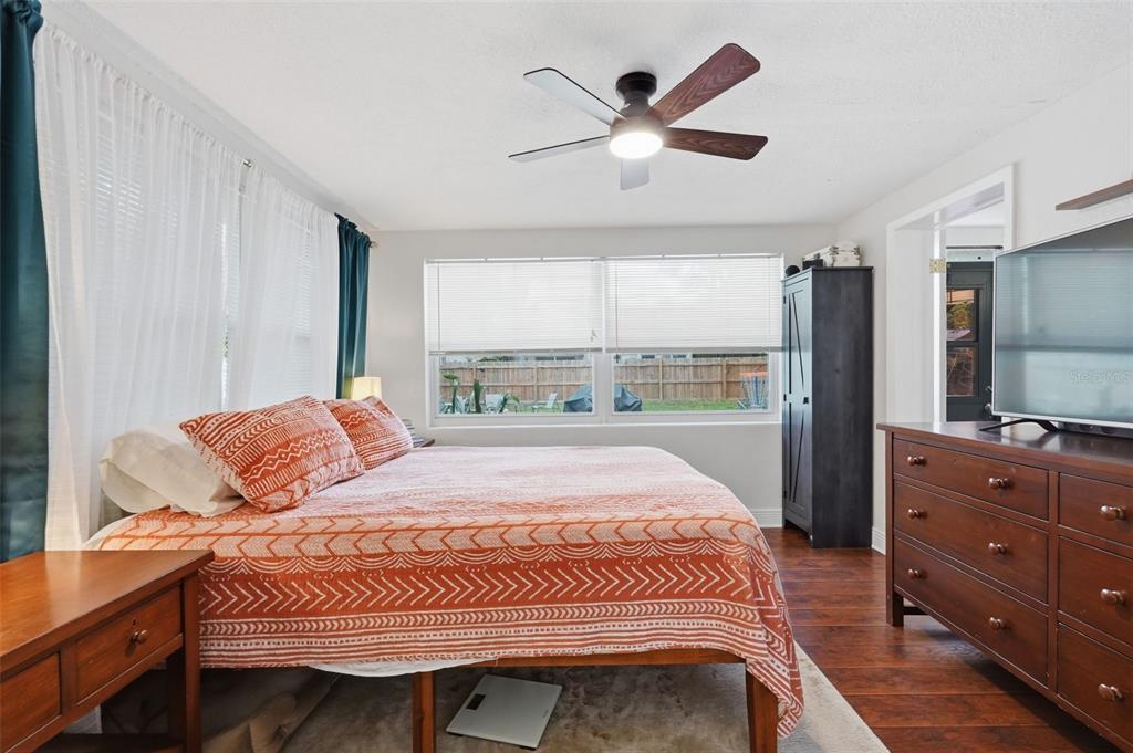 1130 8th Avenue Northeast Largo, FL 33770 - Photo 26 of 39 a bedroom with a bed and a dresser