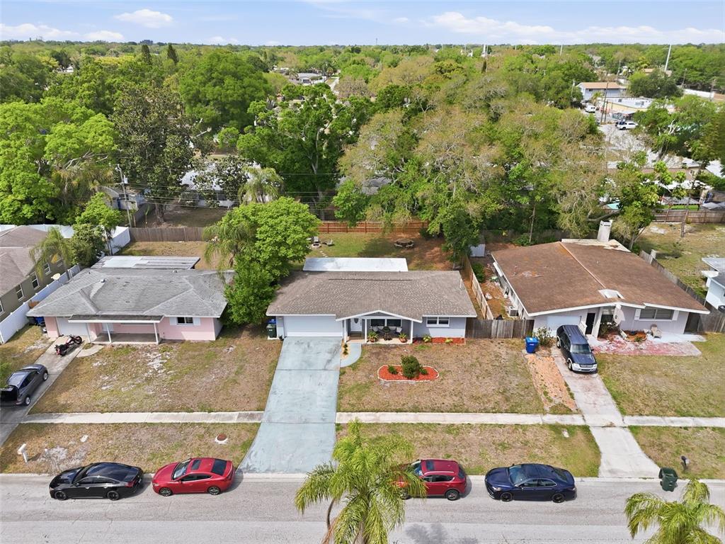 1130 8th Avenue Northeast Largo, FL 33770 - Photo 36 of 39 an aerial view of residential houses with outdoor space