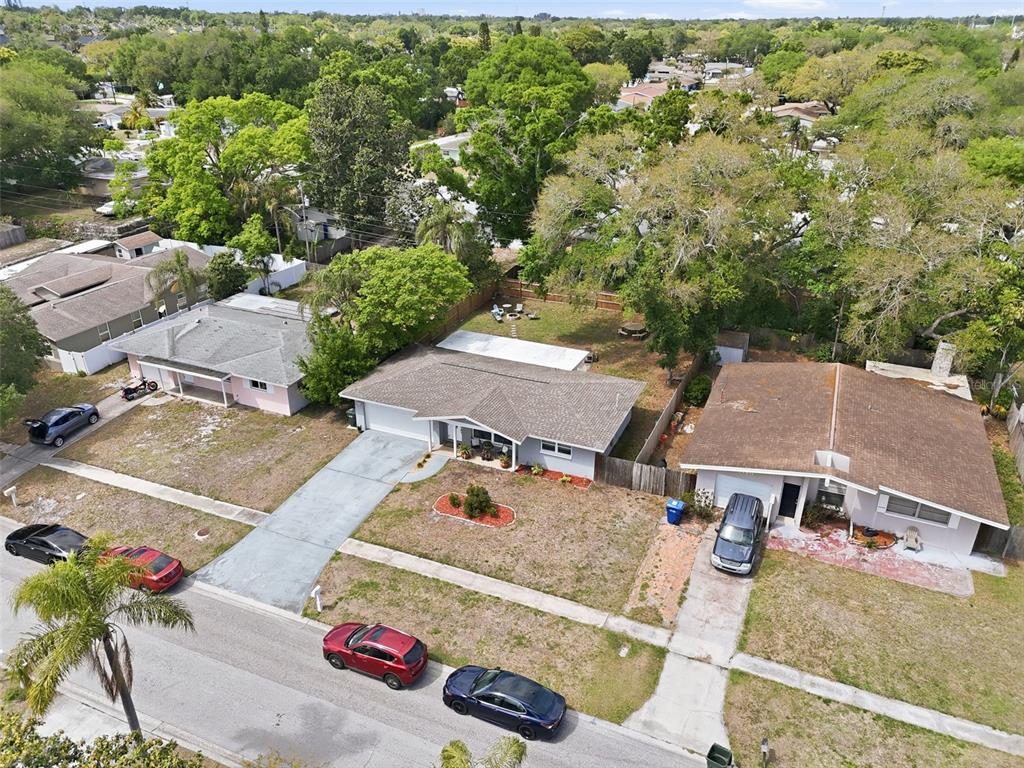 1130 8th Avenue Northeast Largo, FL 33770 - Photo 39 of 39 an aerial view of residential houses with outdoor space