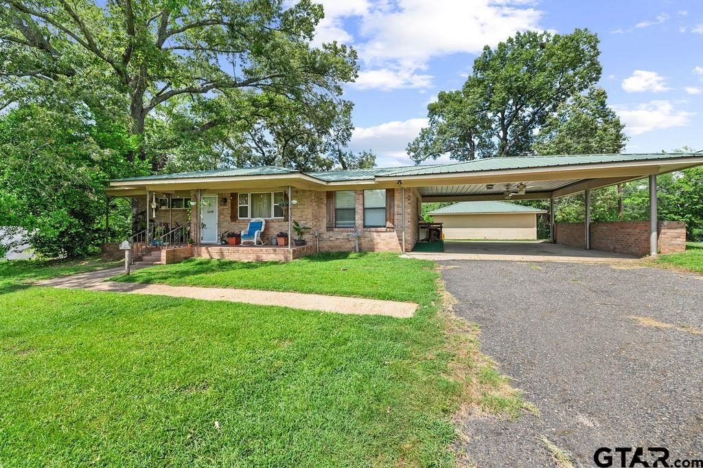 509 Tina Street Quitman, TX 75783 - Photo 16 of 17 a view of outdoor space yard deck and patio