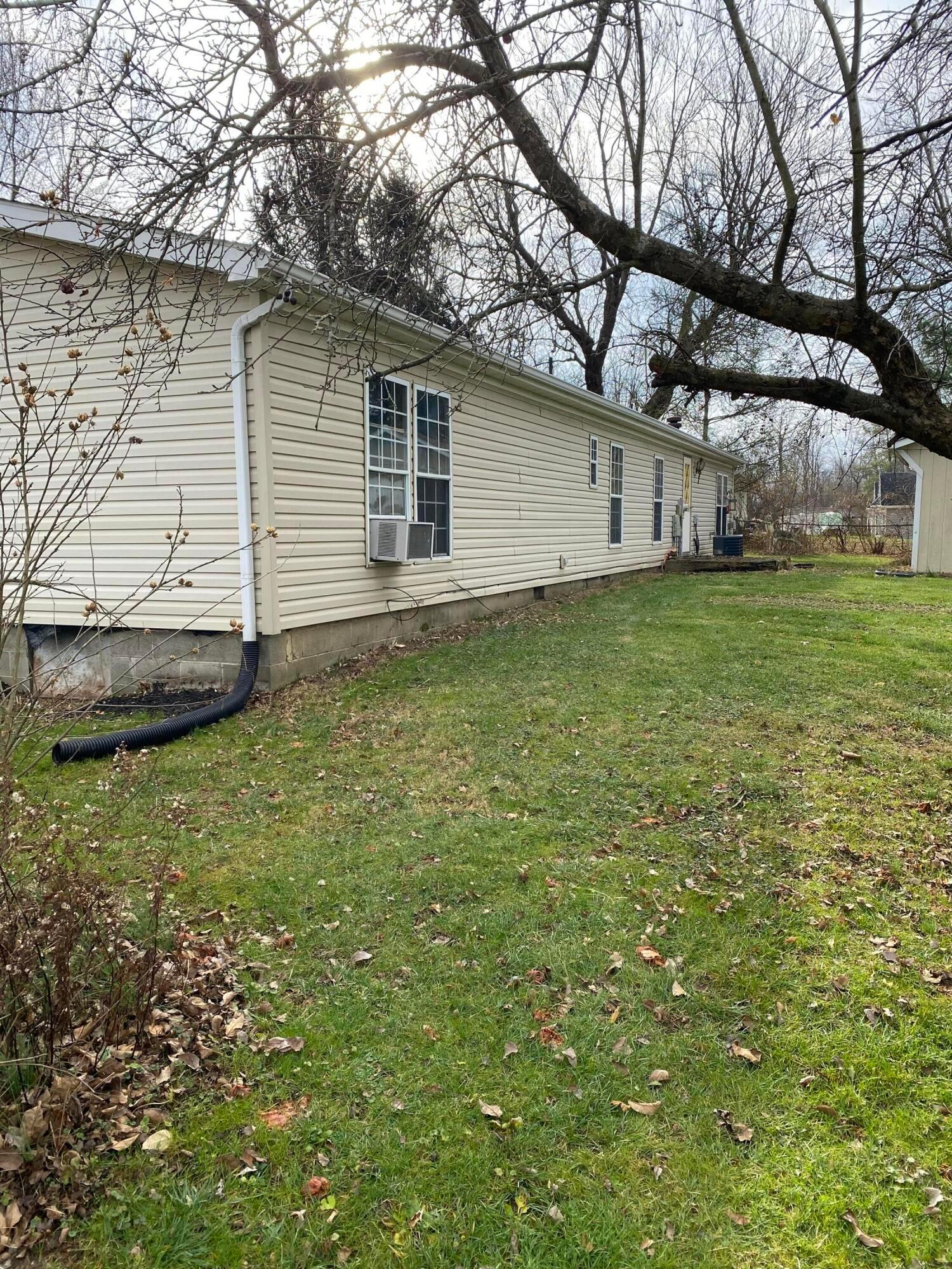 81 Amber Road Southwest Pataskala, OH 43062 - Photo 3 of 26 rear