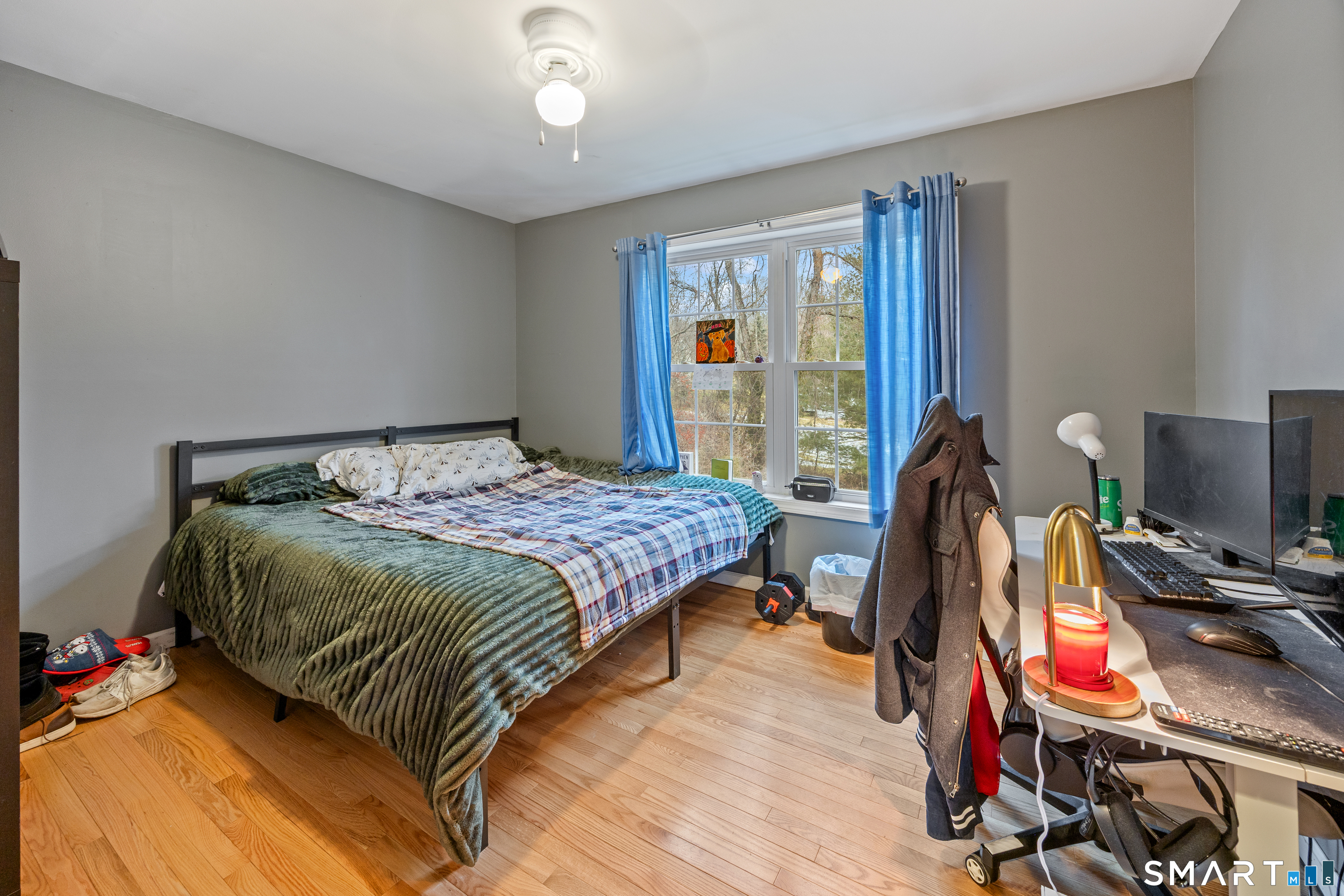 197 Preston Road Plymouth, CT 06786 - Photo 27 of 39 a bedroom with a bed and wooden floor