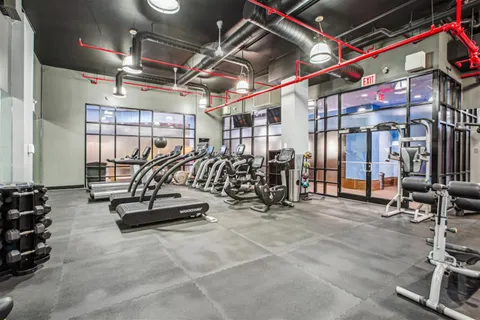 a view of a room with gym equipment