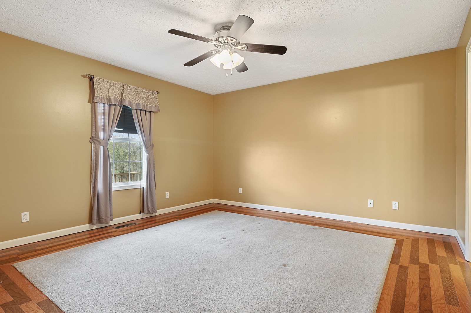 4415 Matthews Road Cedar Hill, TN 37032 - Photo 11 of 19 a view of an empty room with a window