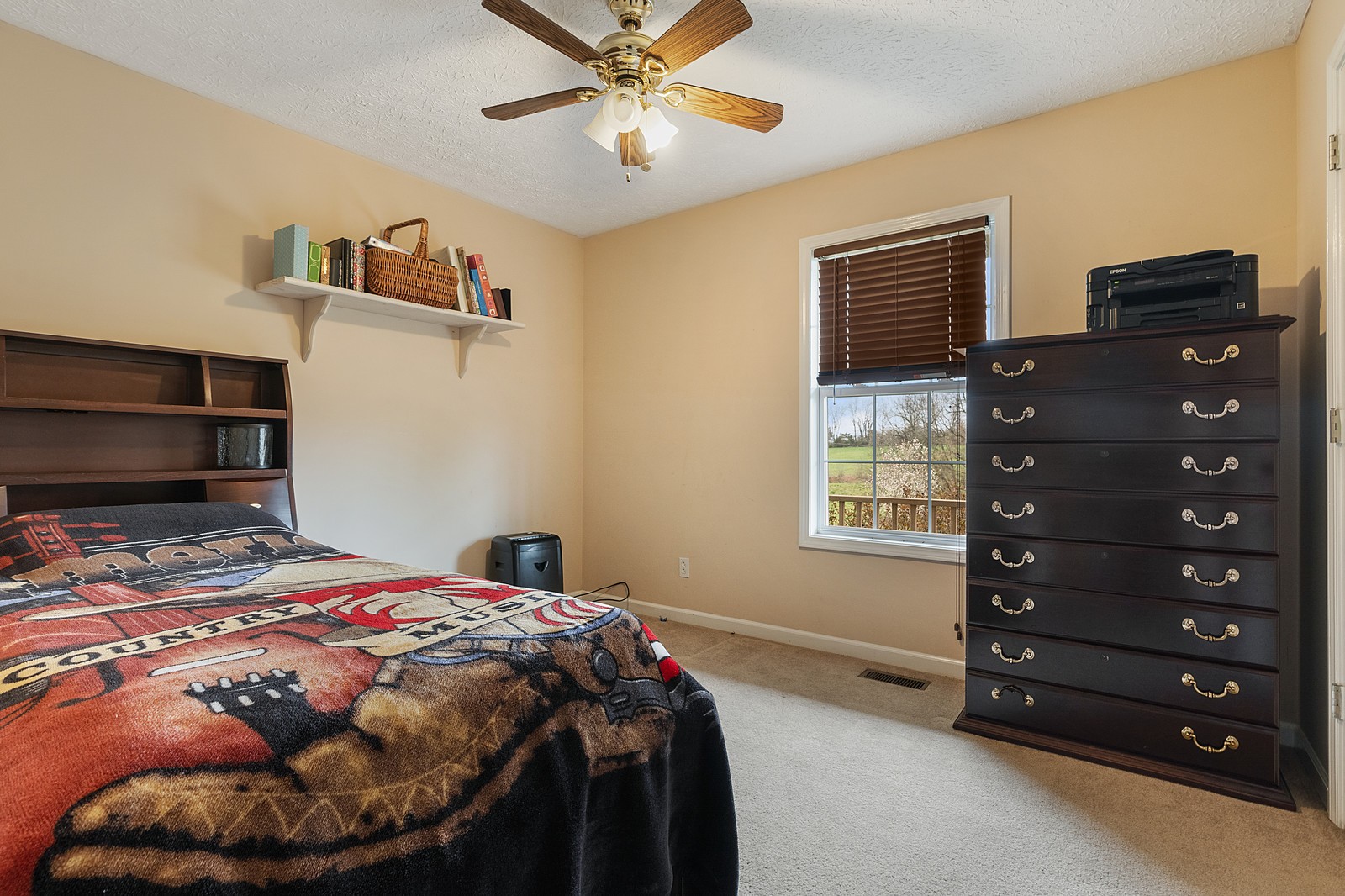 4415 Matthews Road Cedar Hill, TN 37032 - Photo 15 of 19 a bedroom with a bed and a closet