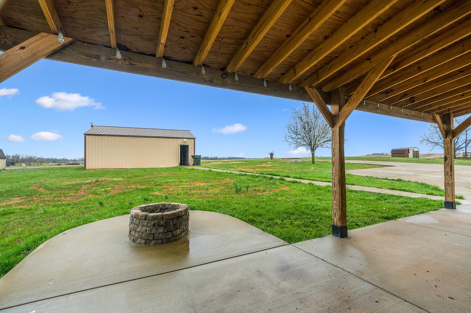 4415 Matthews Road Cedar Hill, TN 37032 - Photo 17 of 19 a view of a house with backyard porch and garden