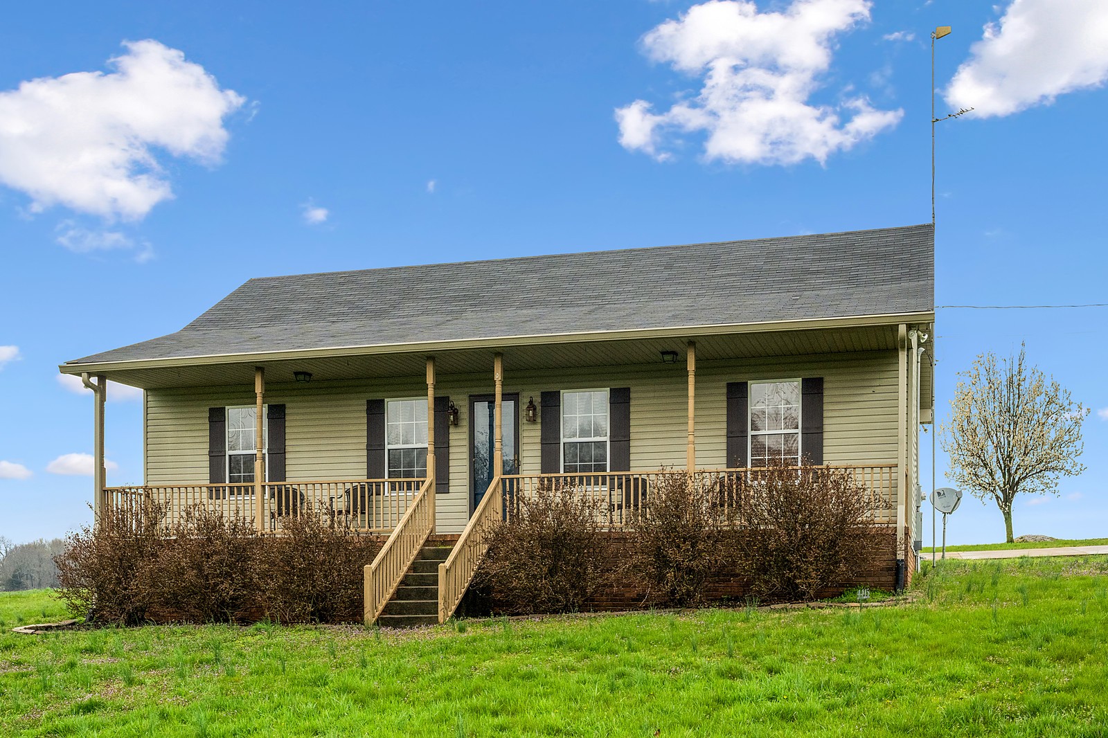 4415 Matthews Road Cedar Hill, TN 37032 - Photo 2 of 19 a front view of a house with a yard