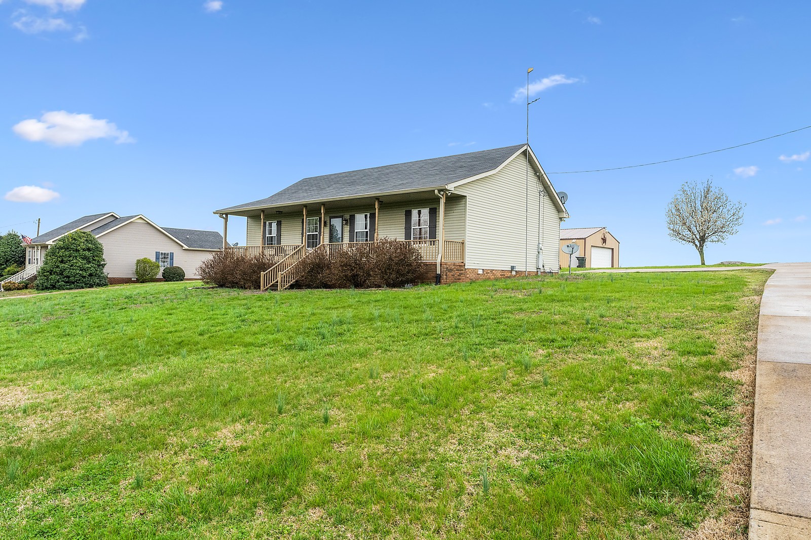 4415 Matthews Road Cedar Hill, TN 37032 - Photo 3 of 19 a view of a house with a yard