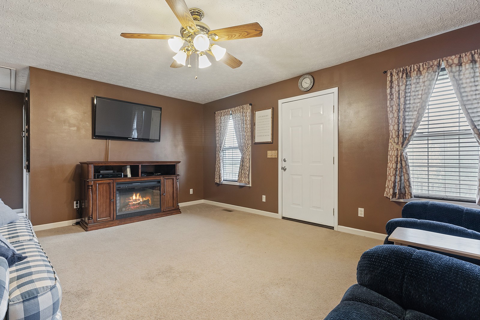 4415 Matthews Road Cedar Hill, TN 37032 - Photo 4 of 19 a living room with furniture and a flat screen tv