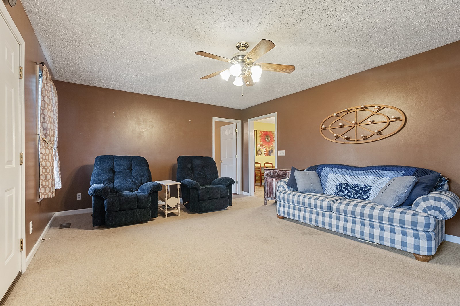 4415 Matthews Road Cedar Hill, TN 37032 - Photo 6 of 19 a living room with furniture and a chandelier