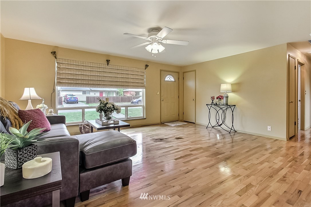 3701 Northeast 9th Street Renton, WA 98056 - Photo 2 of 13 a living room with furniture and a large window