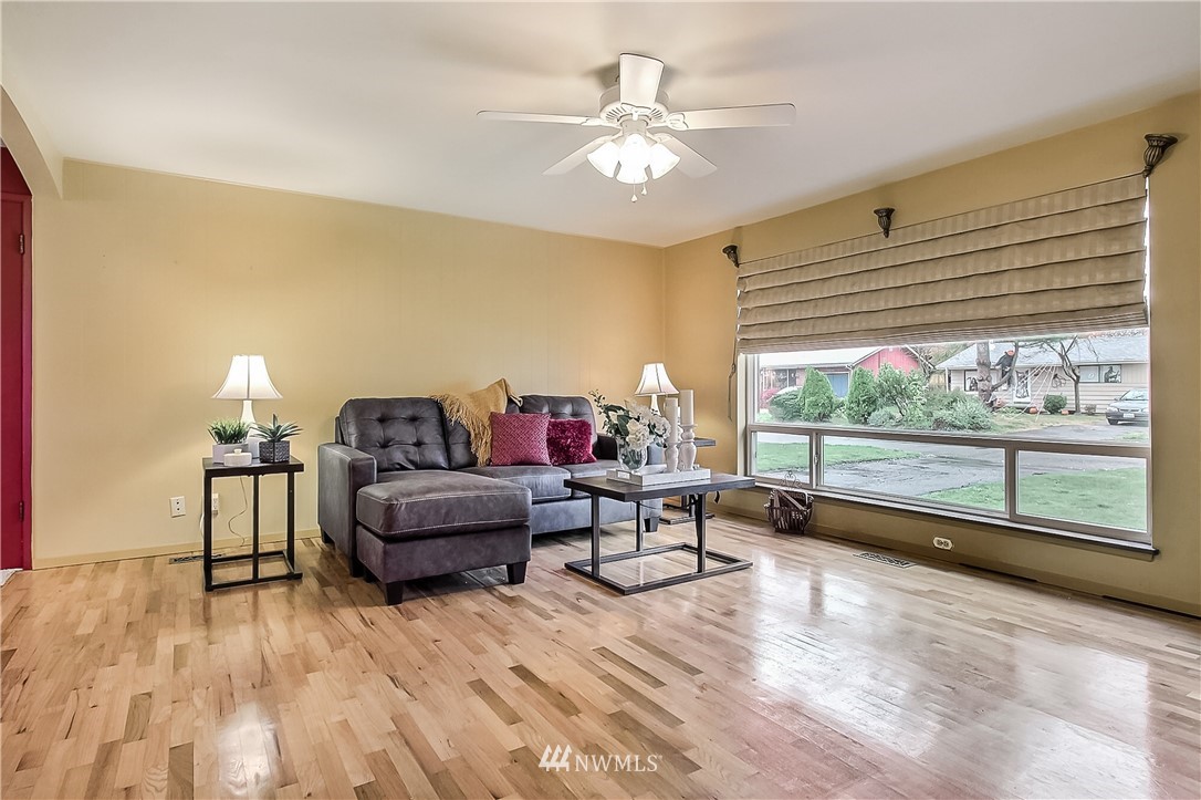3701 Northeast 9th Street Renton, WA 98056 - Photo 3 of 13 a living room with furniture and a large window