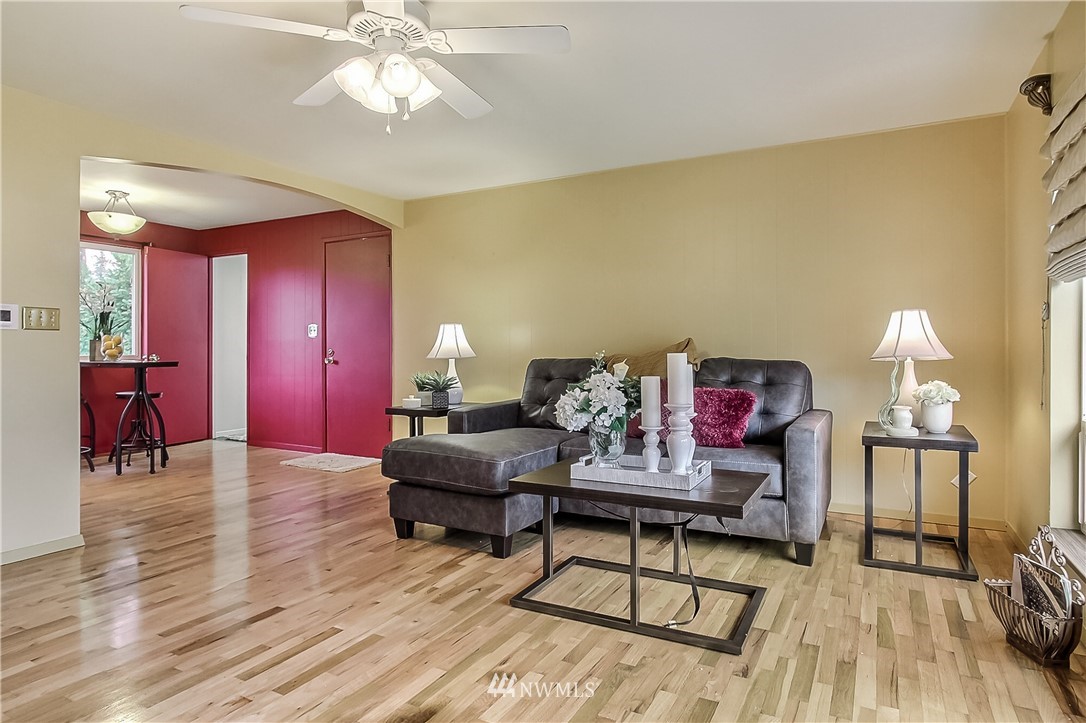 3701 Northeast 9th Street Renton, WA 98056 - Photo 4 of 13 a living room with furniture and a wooden floor