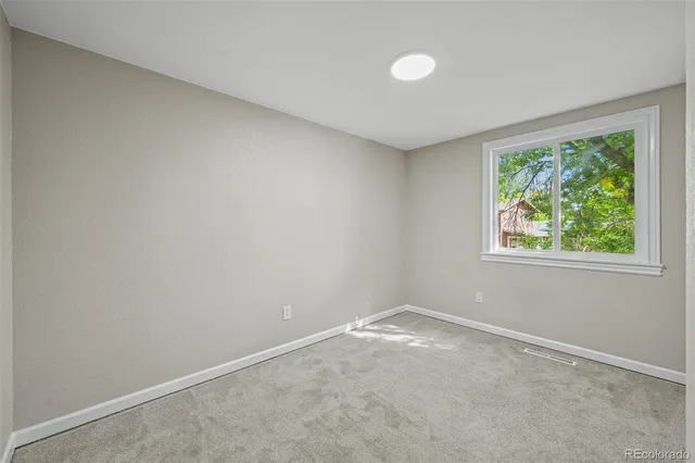 an empty room with a window