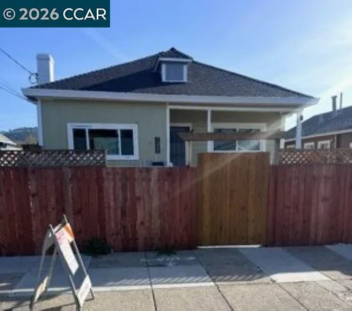a front view of a house with garage