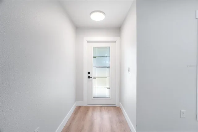 a view of a room that has a window