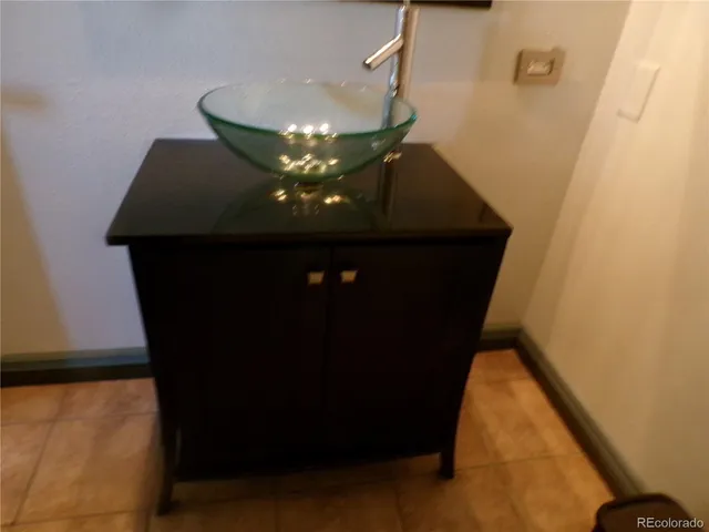 a bathroom with a mirror