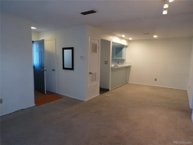 a view of a hallway with closet