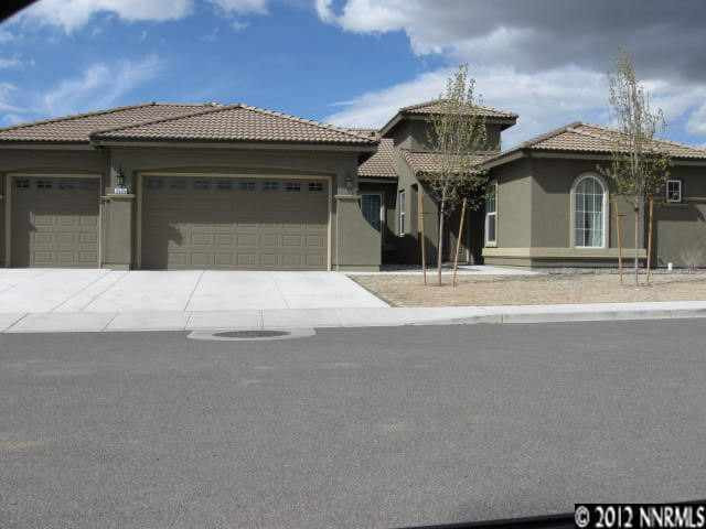 2935 Bull Rider Drive Reno, NV 89521 - Photo 1 of 1 a front view of a building with retail shops