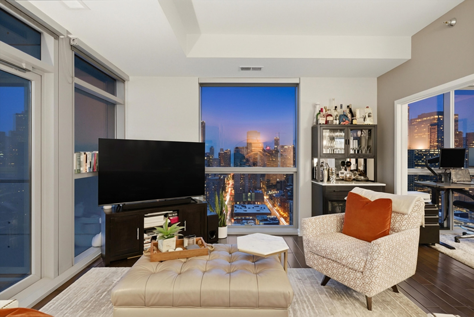 303 West Ohio Street, Unit 3502 Chicago, IL 60654 - Photo 15 of 41 a living room with furniture and a flat screen tv