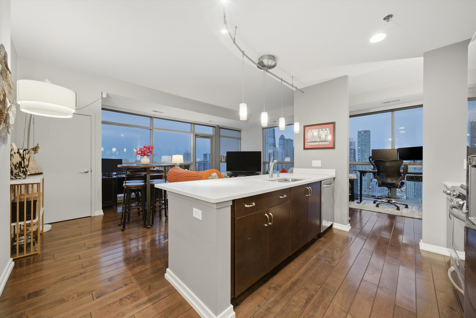 303 West Ohio Street, Unit 3502 Chicago, IL 60654 - Photo 10 of 41 a kitchen with a sink and cabinets