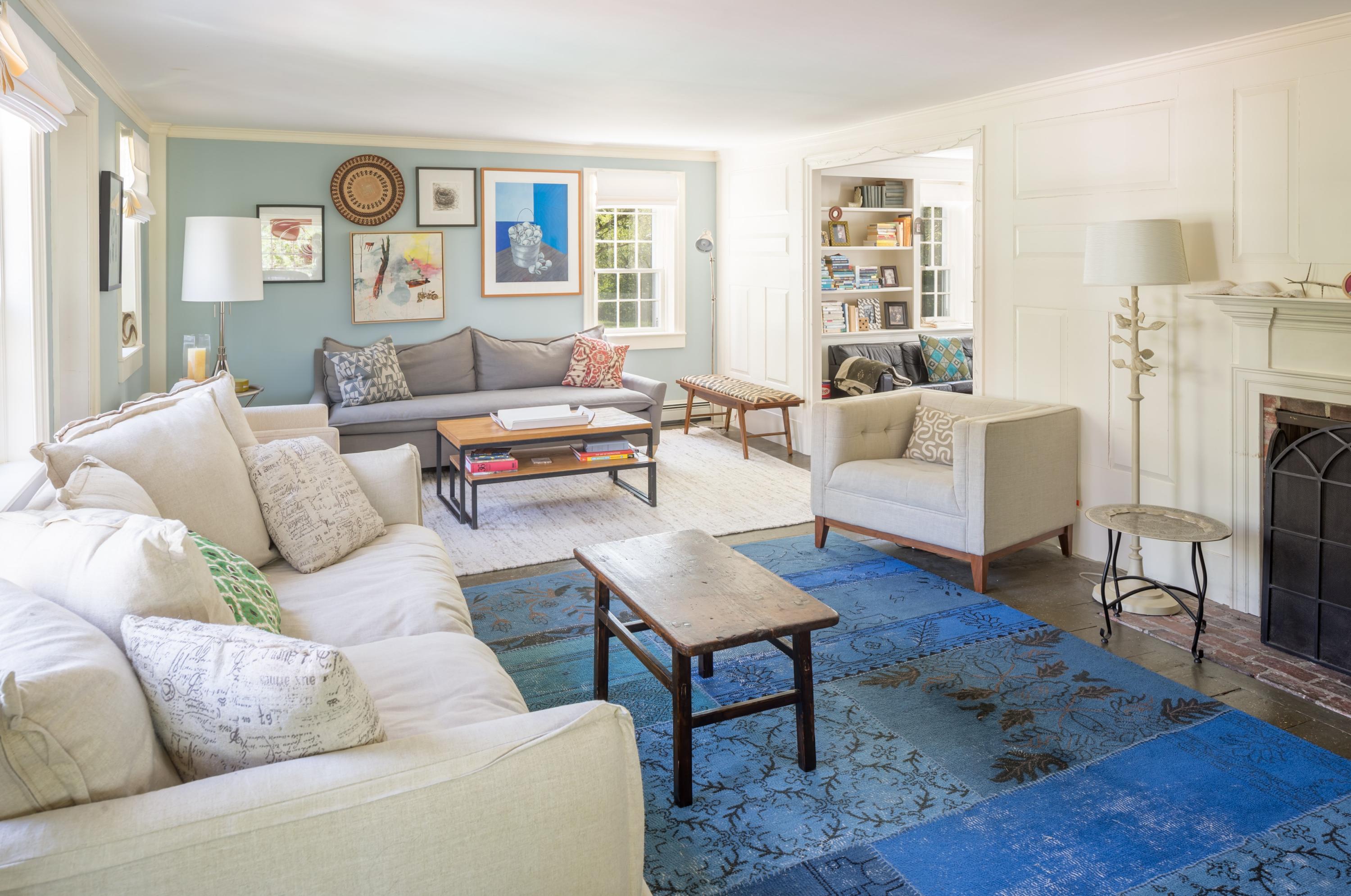 5 Depot Road Truro, MA 02666 - Photo 11 of 21 a living room with furniture and a fireplace