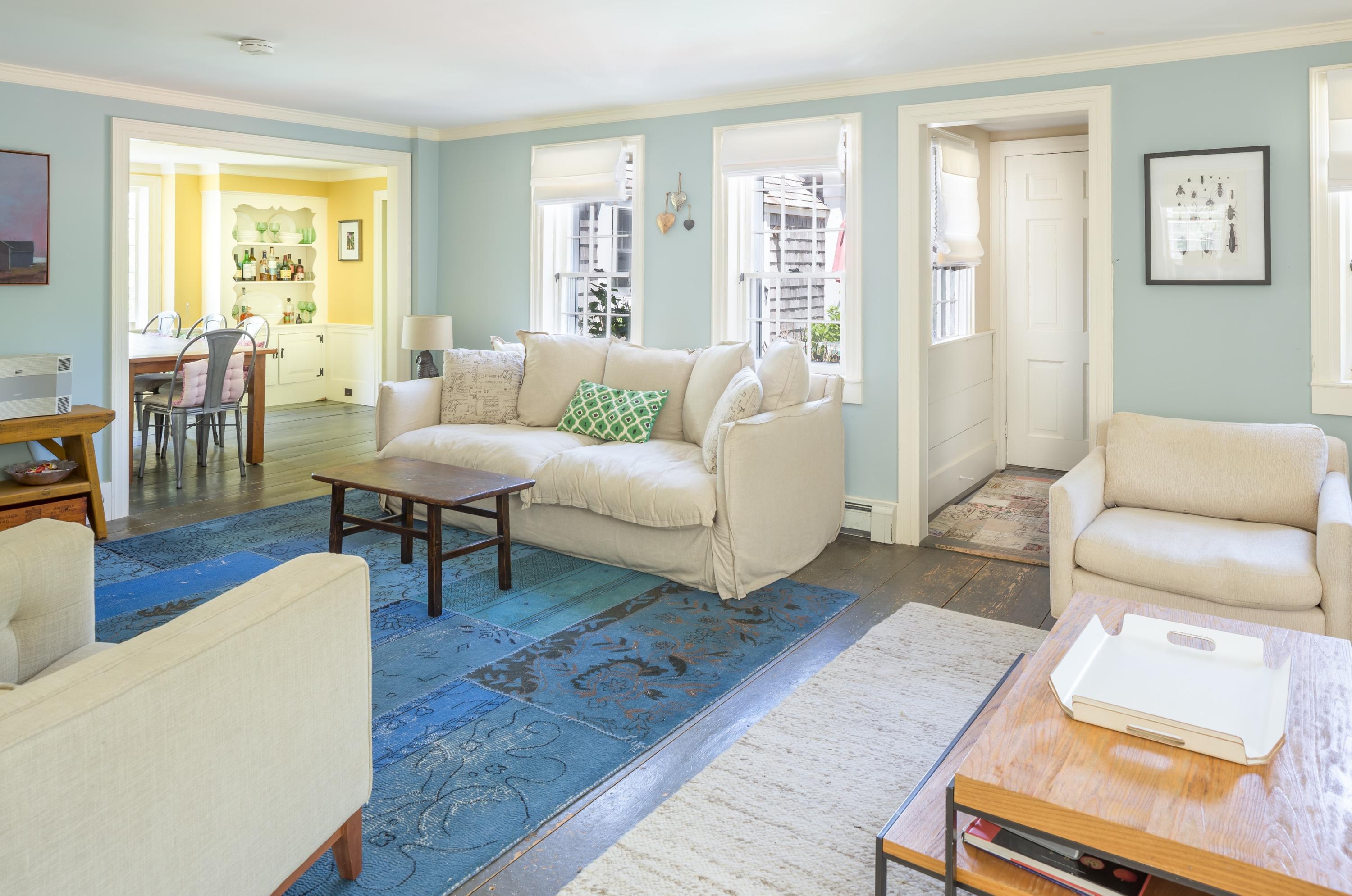 5 Depot Road Truro, MA 02666 - Photo 12 of 21 a living room with furniture and a wooden floor