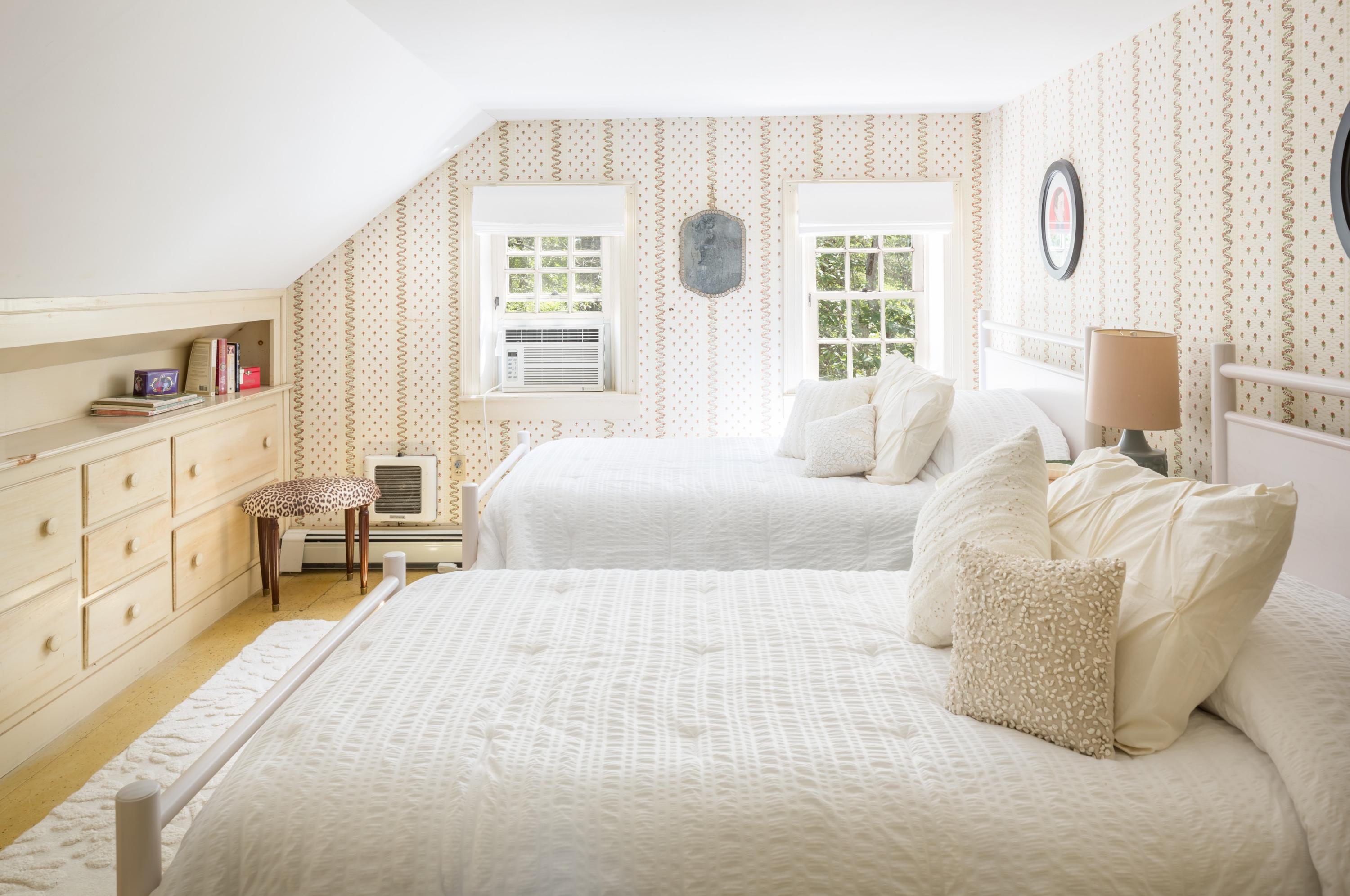 5 Depot Road Truro, MA 02666 - Photo 17 of 21 a bedroom with a bed and a large window