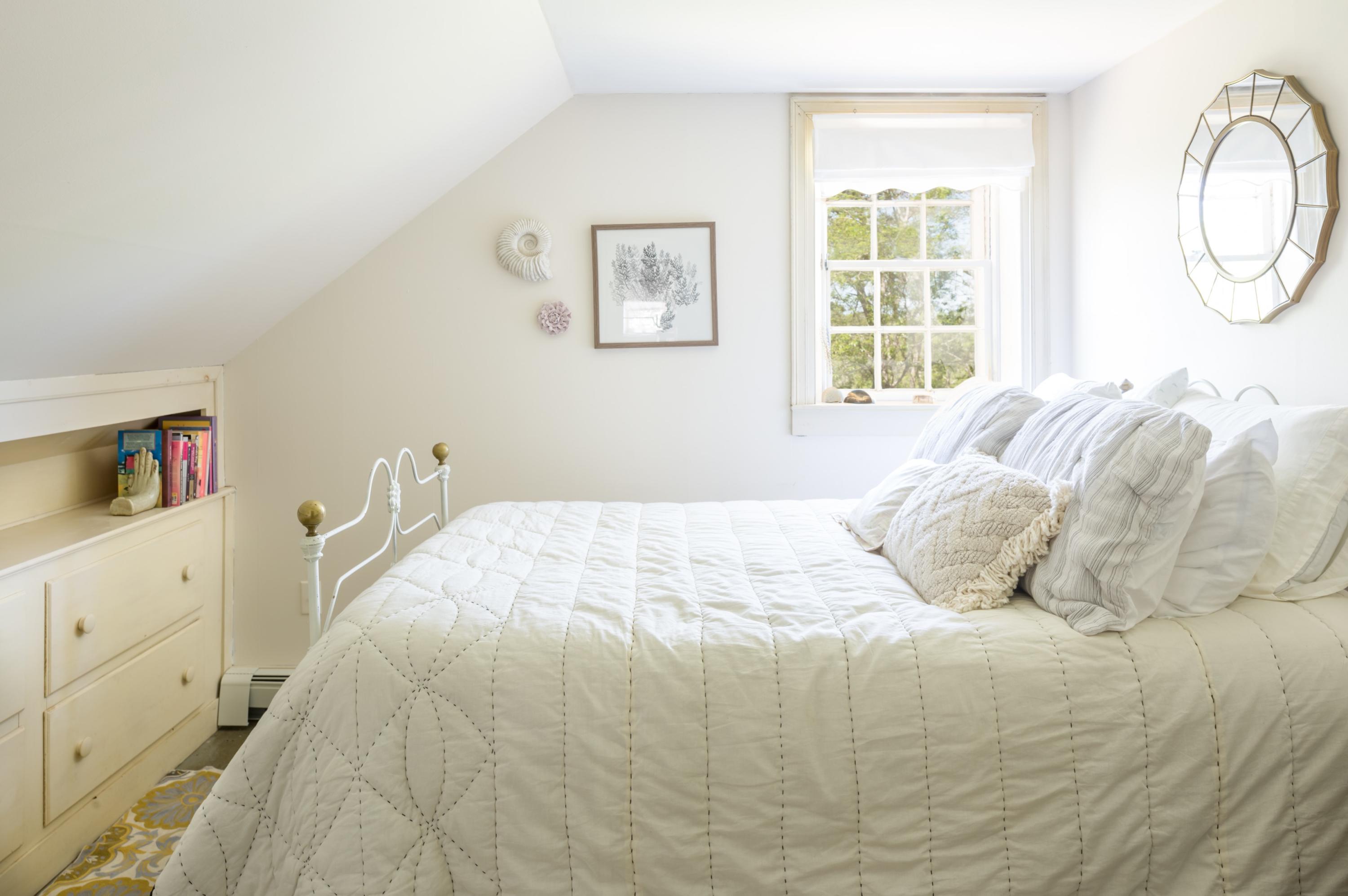 5 Depot Road Truro, MA 02666 - Photo 18 of 21 a bedroom with a bed and a window