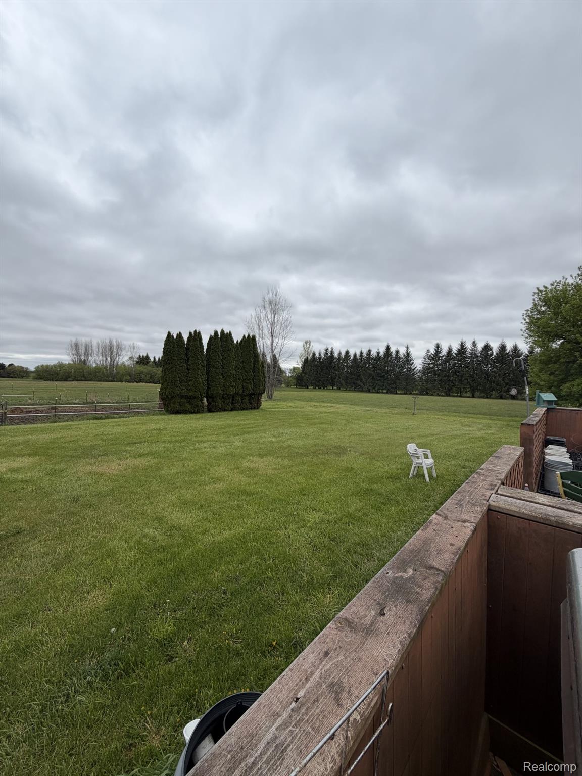 5200 Mayville Road Clifford, MI 48727 - Photo 16 of 17 View of green lawn with a view of rural / pastoral area