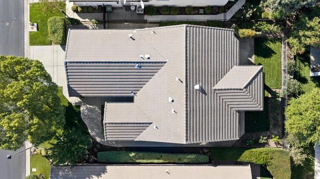 a view of a patio with a bench