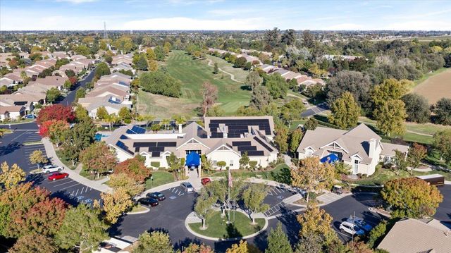 an aerial view of residential building with parking space