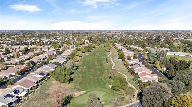 an aerial view of houses and roads