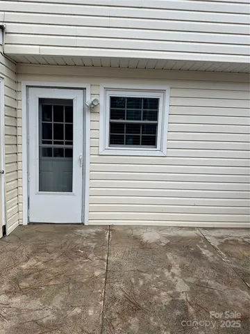 a view of a house with white door